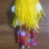 عروسک دست ساز کوچک با موی زرد.🚺