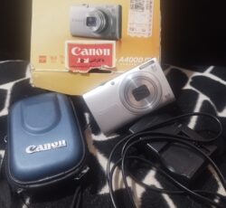 دوربین عکاسی و فیلمبرداری canon مدل A4000 همراه با کیف و شارژر و فاکتور خرید و کارتن ‌کاملا سالم .