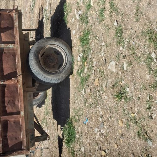 تراکتور285خونگی همراه تریلی چرخ بزرگ