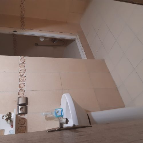 آپارتمان 106 متری طبقه اول با حیاط و زیر زمین زیر بنا 80 متر