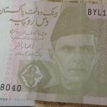 اسکناس 1000دیناری عراق و_10 روپیه پاکستان