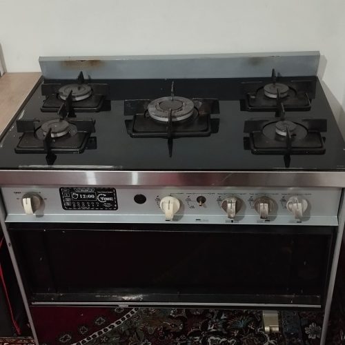 اجاق گاز استیل صحفه ای شیشه ای طرح فر رنگ توسی