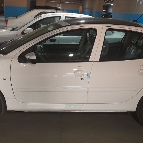 پژو 207 پاناروما دنده‌ای دارای esp سال 1403