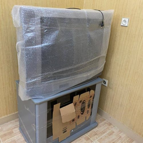 تلویزیون صنام33 اینچ به همراه میز زیرتلویزیونی