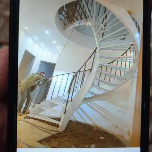 نصب و طراحی انواع پله گردان فلزی و معمولی برای ساختمان