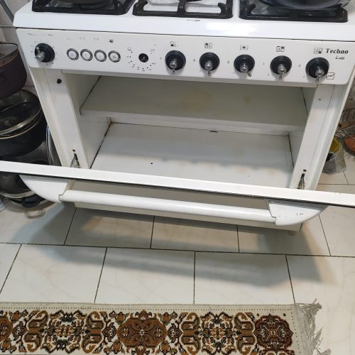 گاز طرح فر صفحه لعابی تمیز وسالم