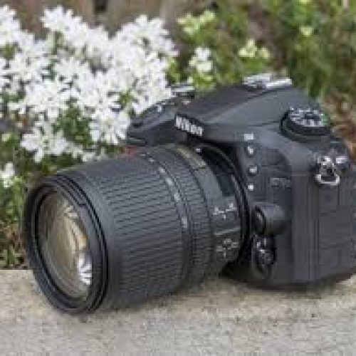 دوربین به همراه سه پایه نیکون 7200