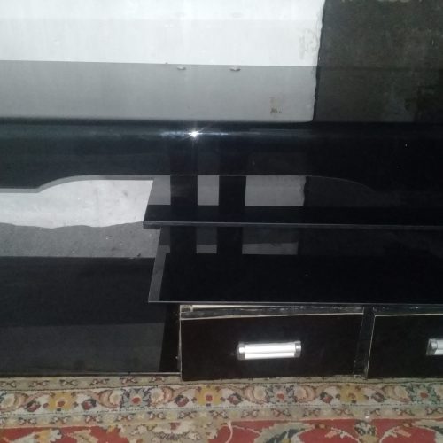درحدنو میز تلوزیون شیشه ای