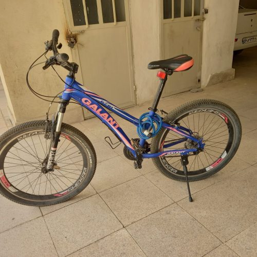 فروش دوچرخه ی دنده ای سالم به همراه باربند دوچرخه