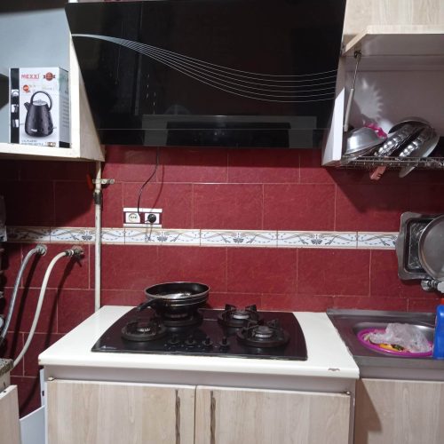 کابینت فلزی کرم رنگ همراه با سینک و هود نو