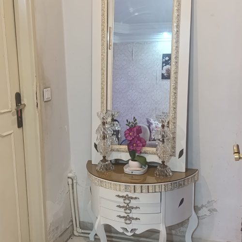 میزتلویزیون آینه کنسول شمعدان ساعت ایستاده