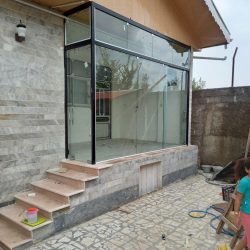 نصب و ایجاد شیشه های سکوریت  و لمینت وکرکره برقی