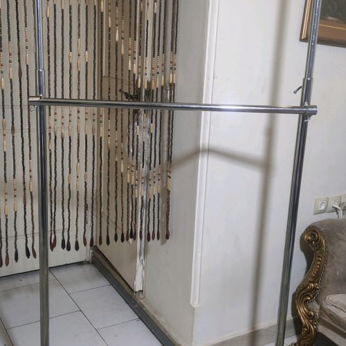 رگال تزیینی دوطبقه لوله ای استیل چرخ دار