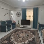 آپارتمان 110متری همراه با مغازه 15 متری