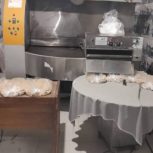 تنورنانوایی مخصوص نان لواش ویک روی سنک مخصوص نان سنگک میباشدنان س