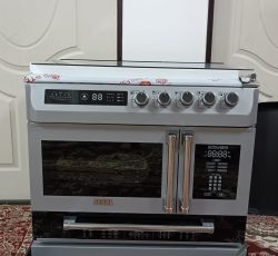 اجاق گاز  صفحه استیل ضخیم طرح فر (آکبند).فروش بعلت نیاز مالی