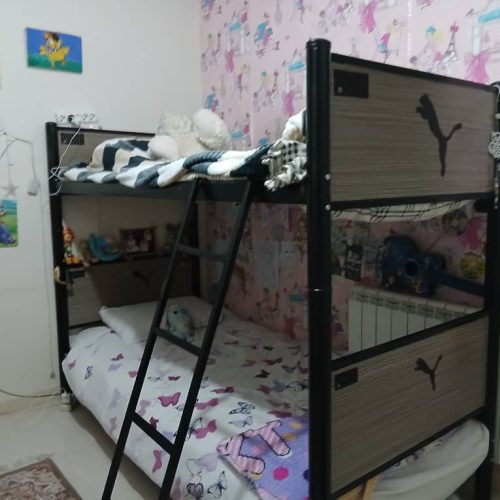 تخت دوطبقه همراه با حفاظ کودک