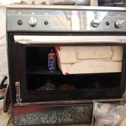 یک عدد اجاق گاز پنج شعله به همراه یک جا کفشی