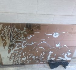 آینه با نقش و نگار برجسته