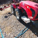 تراکتور کمر شکن همراه با