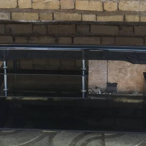 میز شیشه ای تلویزیون