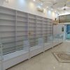دکور داروخانه قفسه دخانیات ویترین مغازه میز کانتر